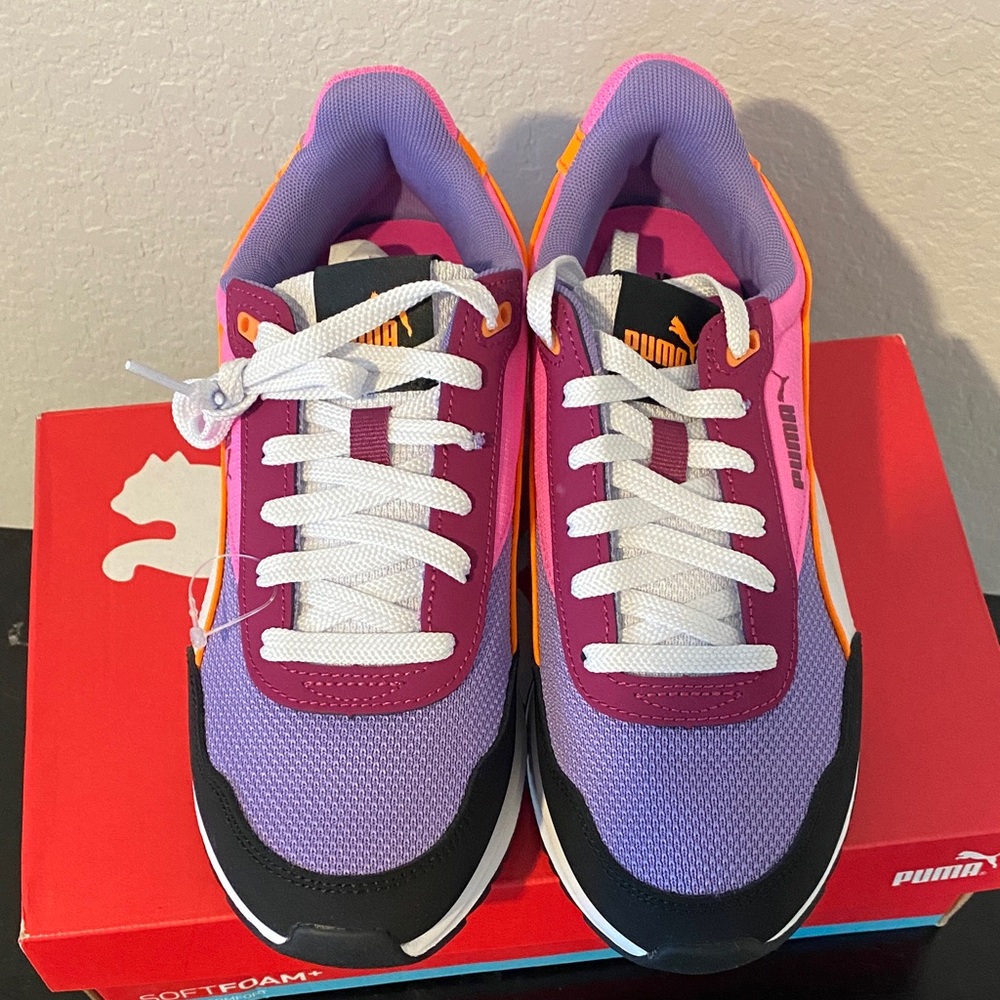 Puma women’s Vibrant Purple and Orange Sneakers
